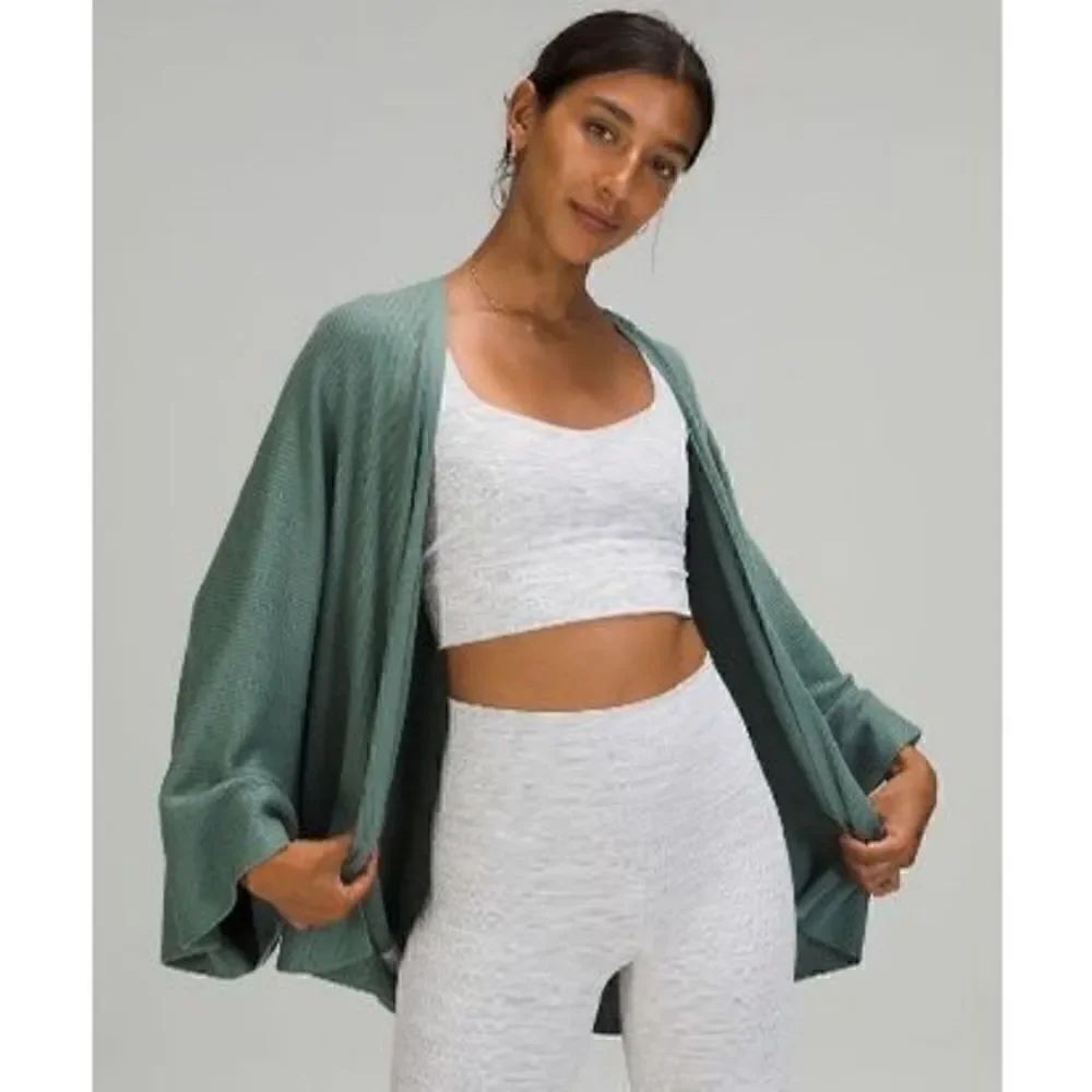 NWOT Lululemon Cashlu Knit Textured Wrap in
Tidewater Teal M/L